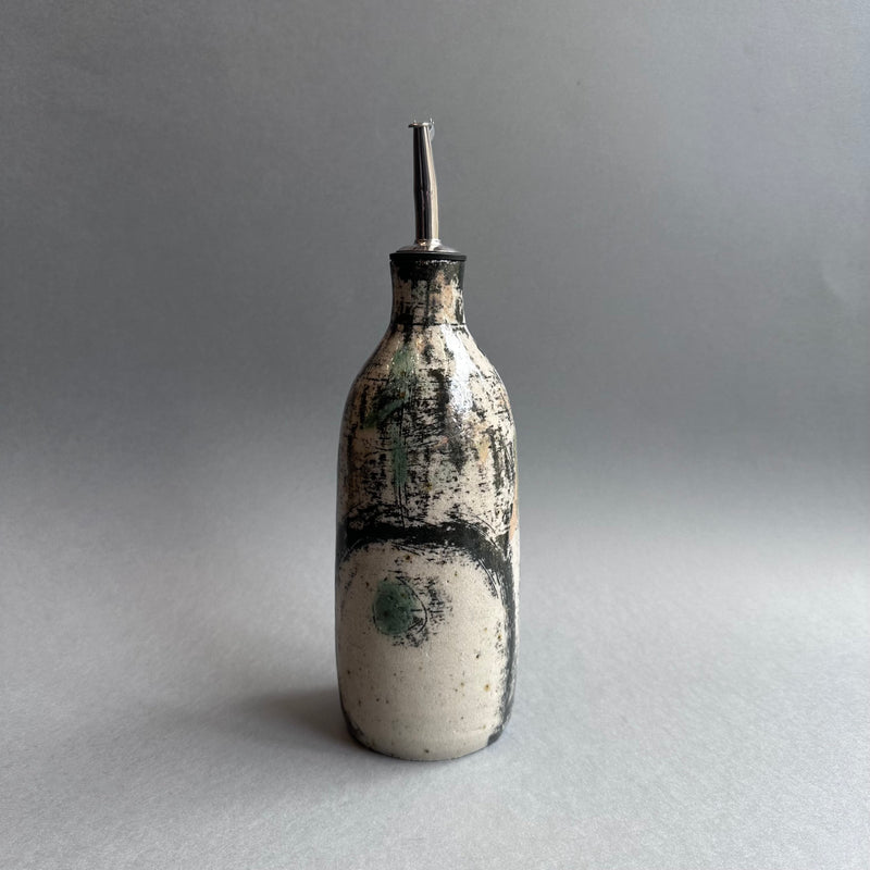 Grasping the Orient Oil Pourer #A