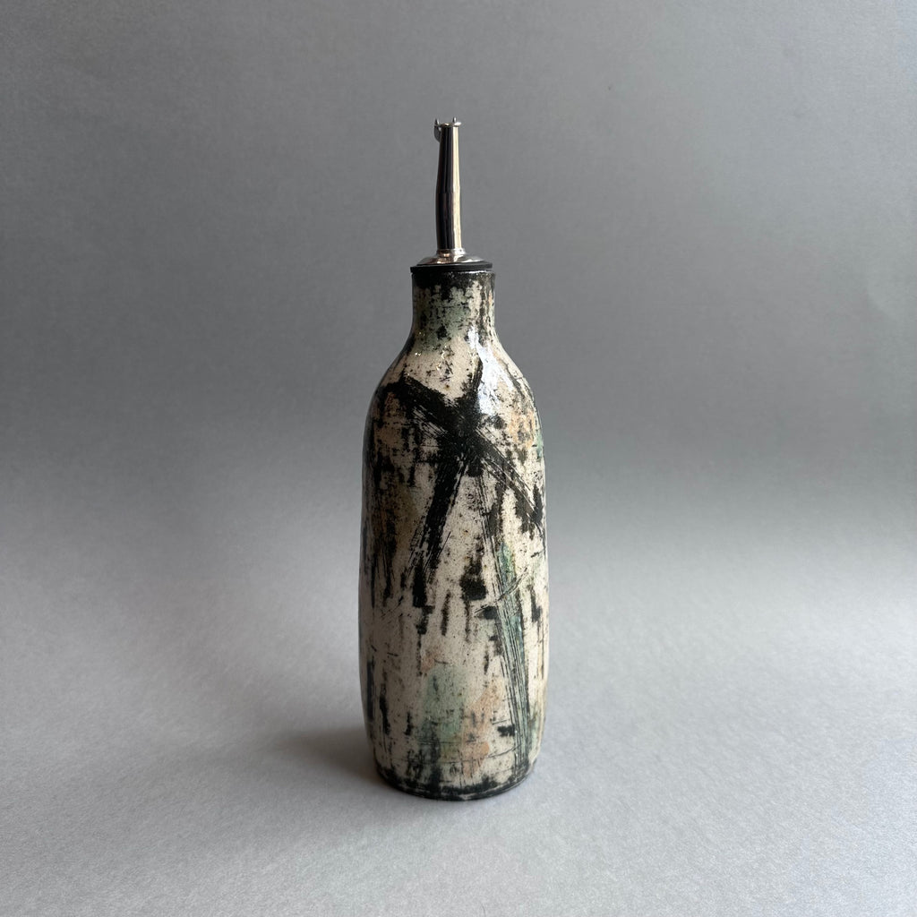 Grasping the Orient Oil Pourer #B