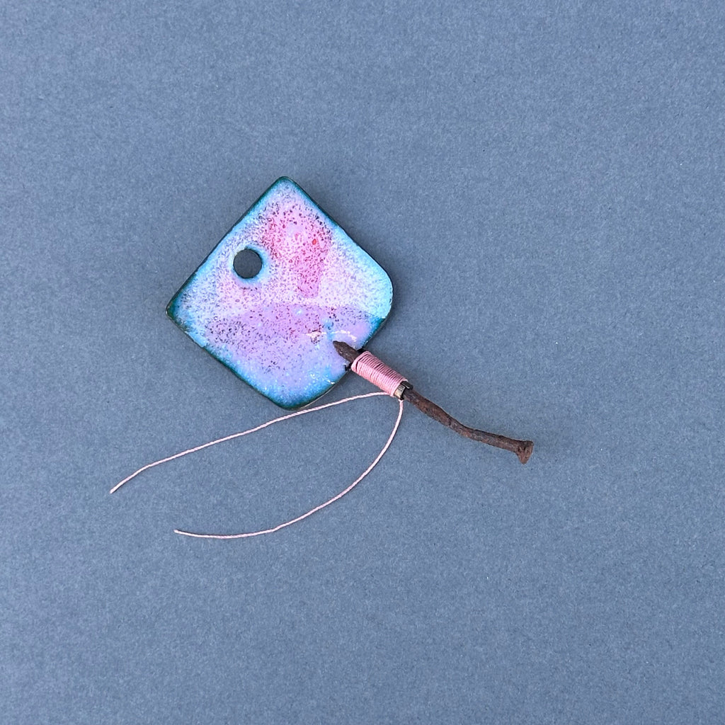 Decorative Enamel Spoon 'Bent Rusty Nail’